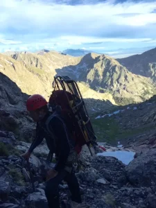 CCSAR member hiking to scene with part of Stokes litter